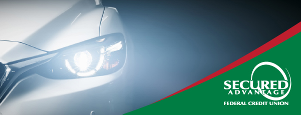 silver car with bright headlights shining with a red and green overlay in corner