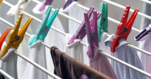 clothes hanging on clothespins drying